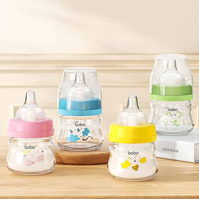 YOHKOH Glass Baby Bottles with Slow Flow Nipple, Newborn Anti-Colic Baby Bottles for 0+ Months, Wide Neck Feeding Bottle, Clear (Yellow, 2.7oz (Pack of 2))