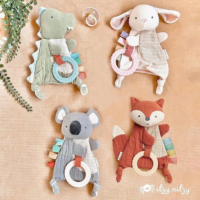 Itzy Ritzy - Bitzy Crinkle Sensory Toy for Babies & Toddlers — Features Crinkle Sound, Soft Braided Teething Toy Ring & Textured Ribbons — Gender Neutral Baby Item for Ages 0 Months & Up, Dinosaur