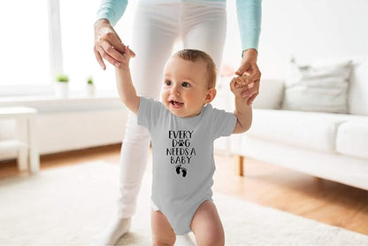 Every Dog Needs a Baby - Funny Baby Essentials Bodysuit - Baby Boy Clothes Newborn Girl Outfits