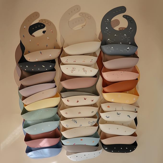mushie Silicone Baby Bib | Adjustable Fit Waterproof Bibs (Rainbows)