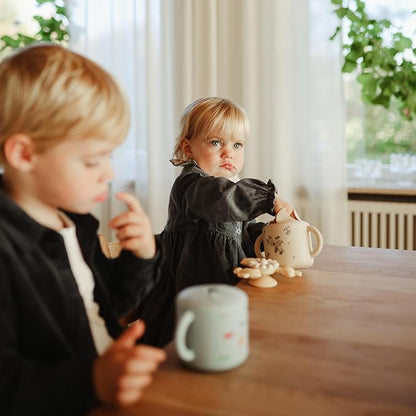 mushie Silicone Snack Cup | Spill Proof Food Container for Toddler and Baby (Lilac Flowers)