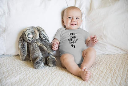 Every Dog Needs a Baby - Funny Baby Essentials Bodysuit - Baby Boy Clothes Newborn Girl Outfits