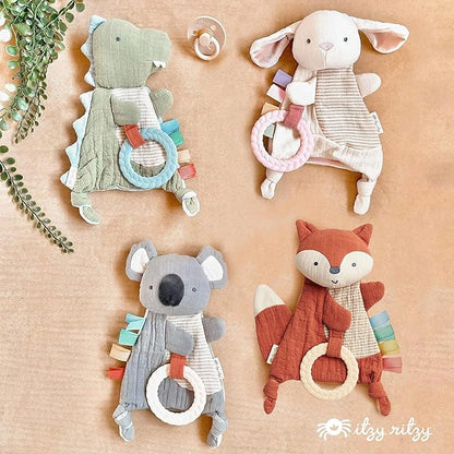 Itzy Ritzy - Bitzy Crinkle Sensory Toy for Babies & Toddlers — Features Crinkle Sound, Soft Braided Teething Toy Ring & Textured Ribbons — Gender Neutral Baby Item for Ages 0 Months & Up, Dinosaur